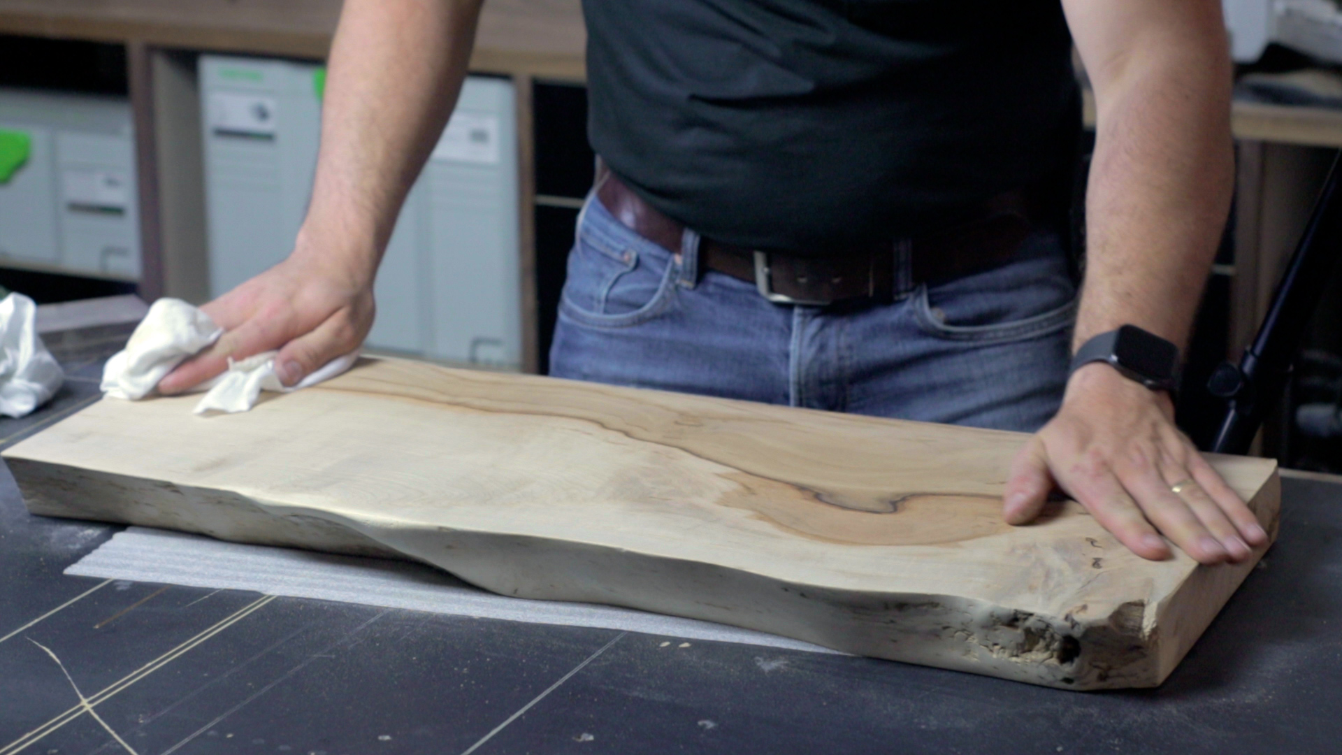 Wiping Dust off a Live Edge Shelf